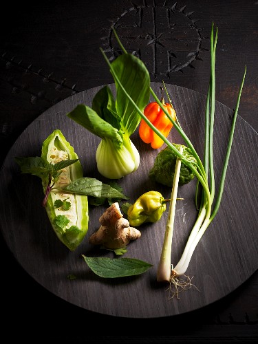 Ingredients for oriental chicken soup with vegetables and kaffir limes