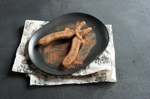 Chocolate pliers dusted with cocoa powder