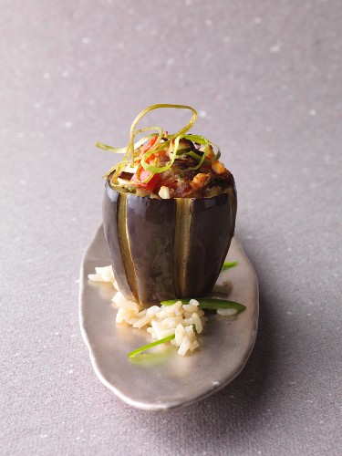 An aubergine filled with pilau rice (vegetarian)