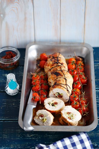 Turkey roulade stuffed with courgette, feta cheese and dried tomatoes