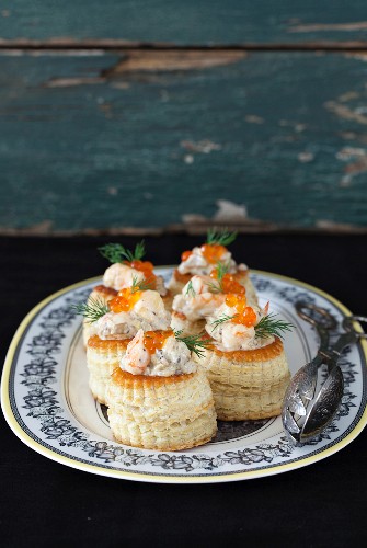 Vol-au-vents with a creamy mushroom sauce, shrimps, caviar and dill