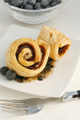 Pork fillet wrapped in puff pastry with blueberries