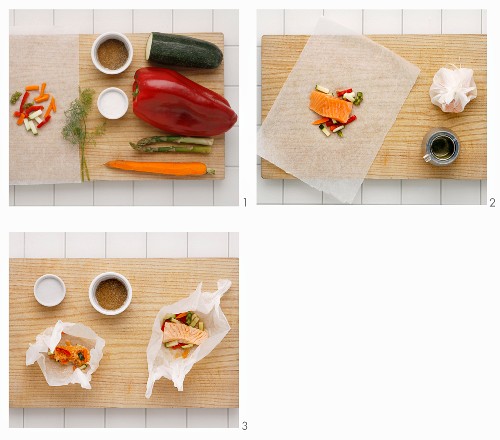 Salmon with colourful vegetables being baked in parchment paper