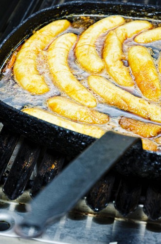 Fried bananas in frying pan