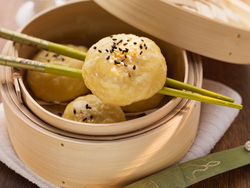 Chinese stuffed yeast dumplings in bamboo steamer