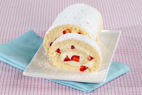 Sponge Swiss roll with a strawberry and cream filling