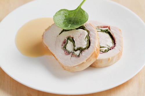 Turkey roulade filled with spinach and feta cheese