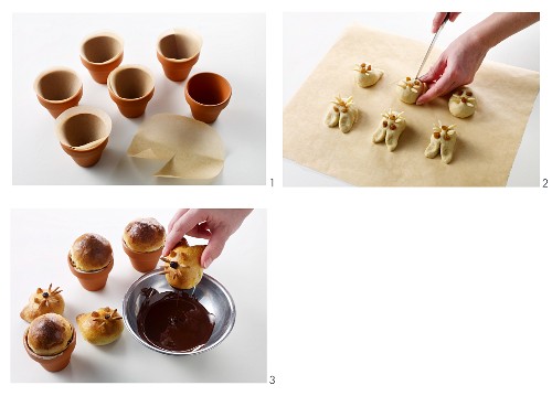 Yeast dough rabbits being baked in mini flowerpots