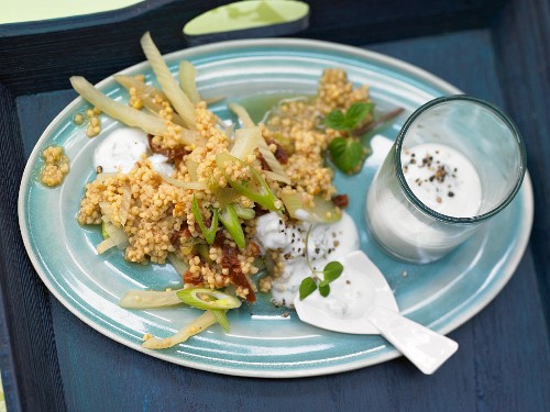 Millet and vegetable pot with mint yoghurt sauce