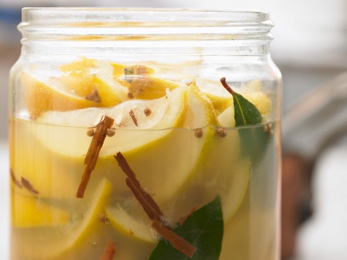 Moroccan preserved lemons with cinnamon and bay leaves
