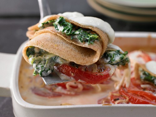 Wholegrain crespelle stuffed with spinach and ricotta