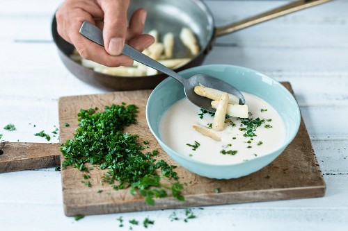 White asparagus tips in cream of asparagus soup