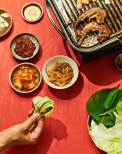 Samgyeopsal gui - grilled pork belly in a lettuce leaf, Korea