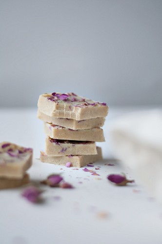 White chocolate with dried rose petals, cashew nuts, organic cocoa butter, honey, and vanilla