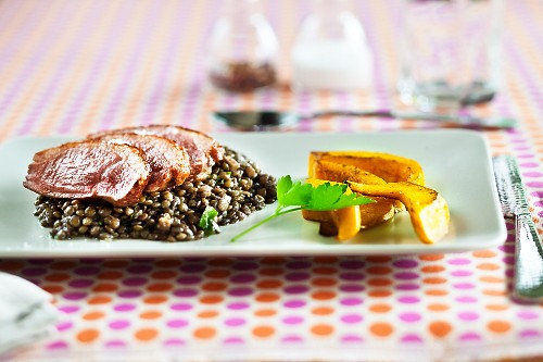 Duck breast with lentil salad and pumpkin