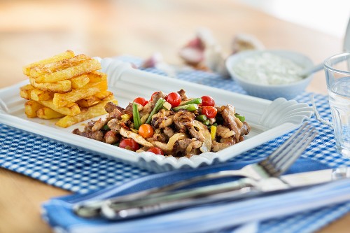 Greek-style kebab meat with chips