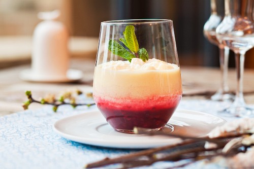 White chocolate mousse with raspberry sauce