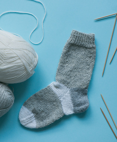 A hand-knitted sock