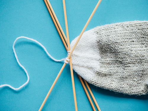 A sock being knitted: toe reinforcement