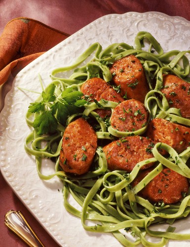 Sausage and spinach pasta with parsley