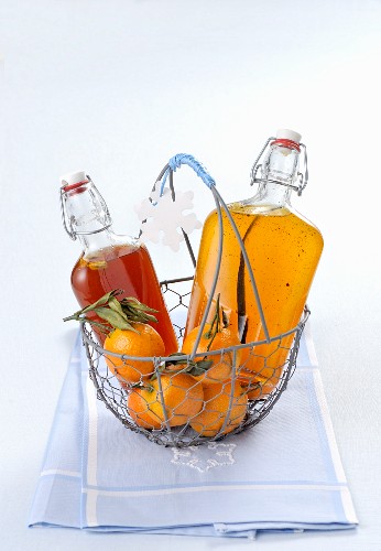 Orange and mandarin syrup in flip-top bottles