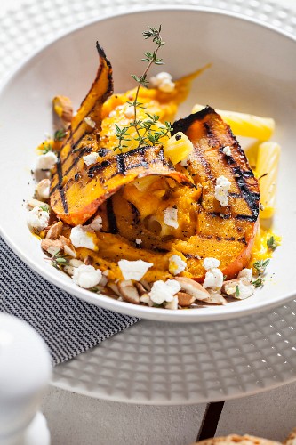 Penne pasta with grilled pumpkin and thyme