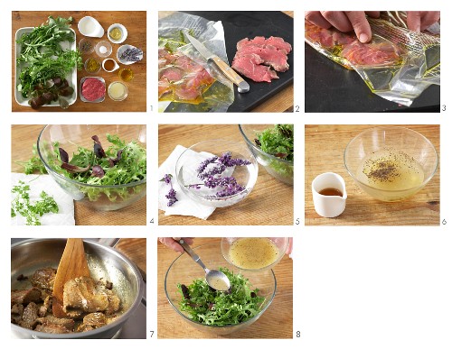 A mixed leaf salad with fine beef fillet strips being made