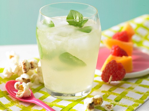 Melon punch with a fruit kebab