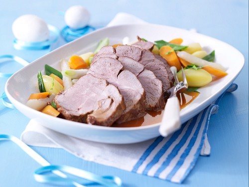 Roast lamb with spring vegetables & new potatoes