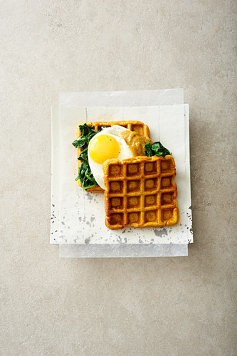 Sweet potato waffles with spinach and egg