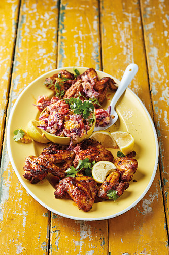 Tikka chicken wings with cooling chopped salad