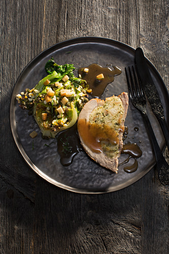 Stuffed pork brisket with braised lettuce and capers
