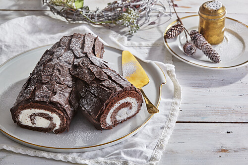 Chocolate roulade with cream filling for Christmas