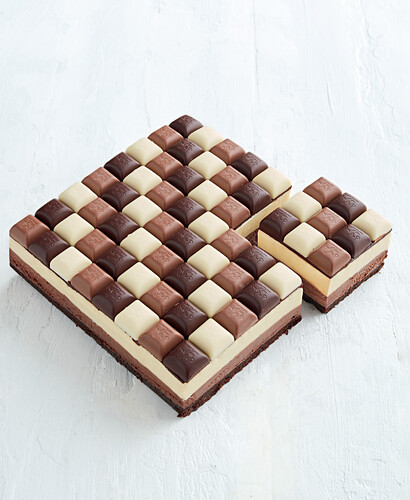 Triple chocolate cheesecake chessboard topper