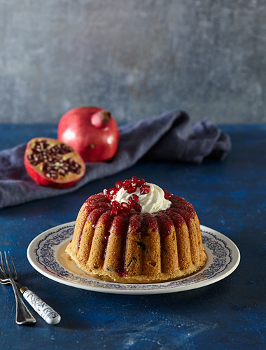 Coconut cake with pomegranate syrup