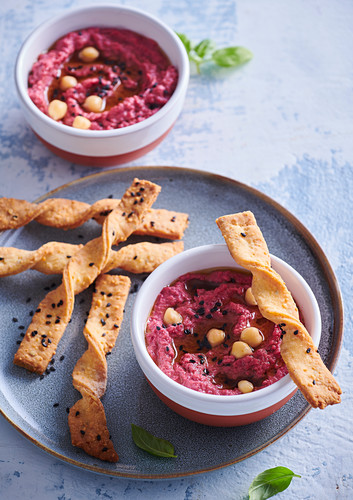 Hummus with beetroot and cheese sticks