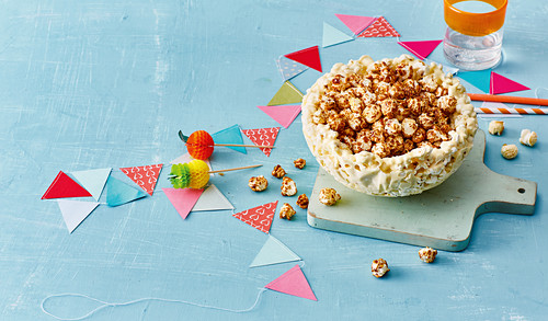 Popcorn bowl filled with popcorn for a children's birthday party