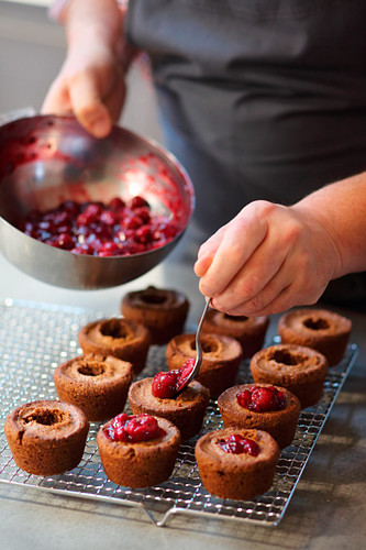 Black Forest cupcakes being filled