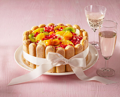 New Year's cake with ladyfingers and fruit