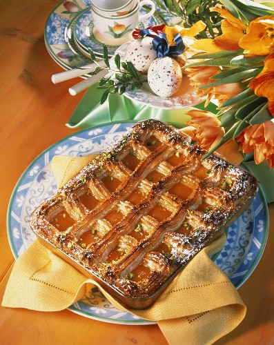 Apricot and almond cake with marzipan lattice