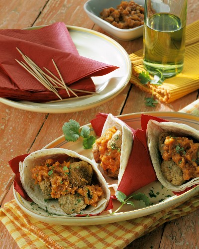 Wraps with meatballs and tomato sauce