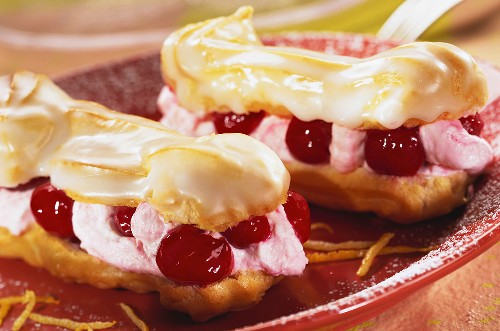 Eclairs filled with sour cherries and cream