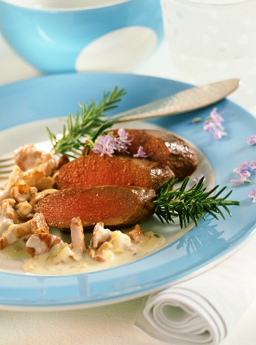 Roast saddle of venison with chanterelles and rosemary