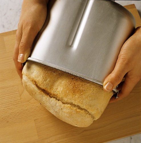 Turning white bread out of the baking tin
