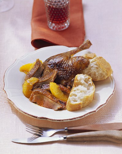 Canard à l’orange with baguette