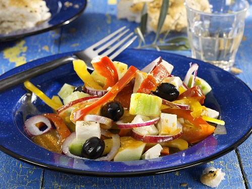 Greek salad on a glass plate