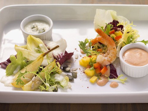 Prawn salad with Thousland Island Dressing and pear salad with blue cheese dressing