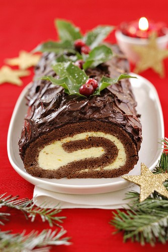 Chocolate sponge roll with orange cream filling (Christmas)