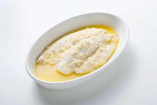 Pangasius fillet poached in butter