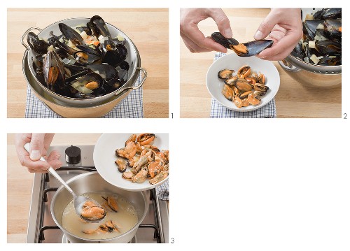 Taking cooked mussels out of their shells